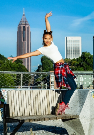 Watts preforming her gymnastics routine