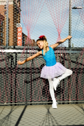 Young gymnasts take to the streets of Atlanta to show off their skills and strength. Photos by Urban Flair Photography, Starr Petronella